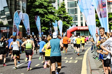 Run a marathon for charity .